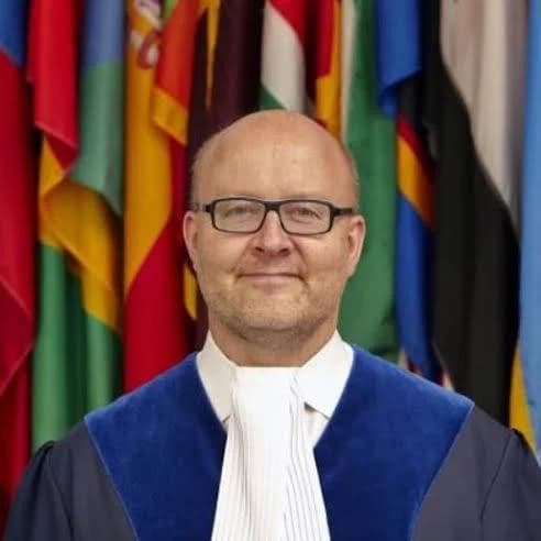 H.E. Judge Tomas Heidar 